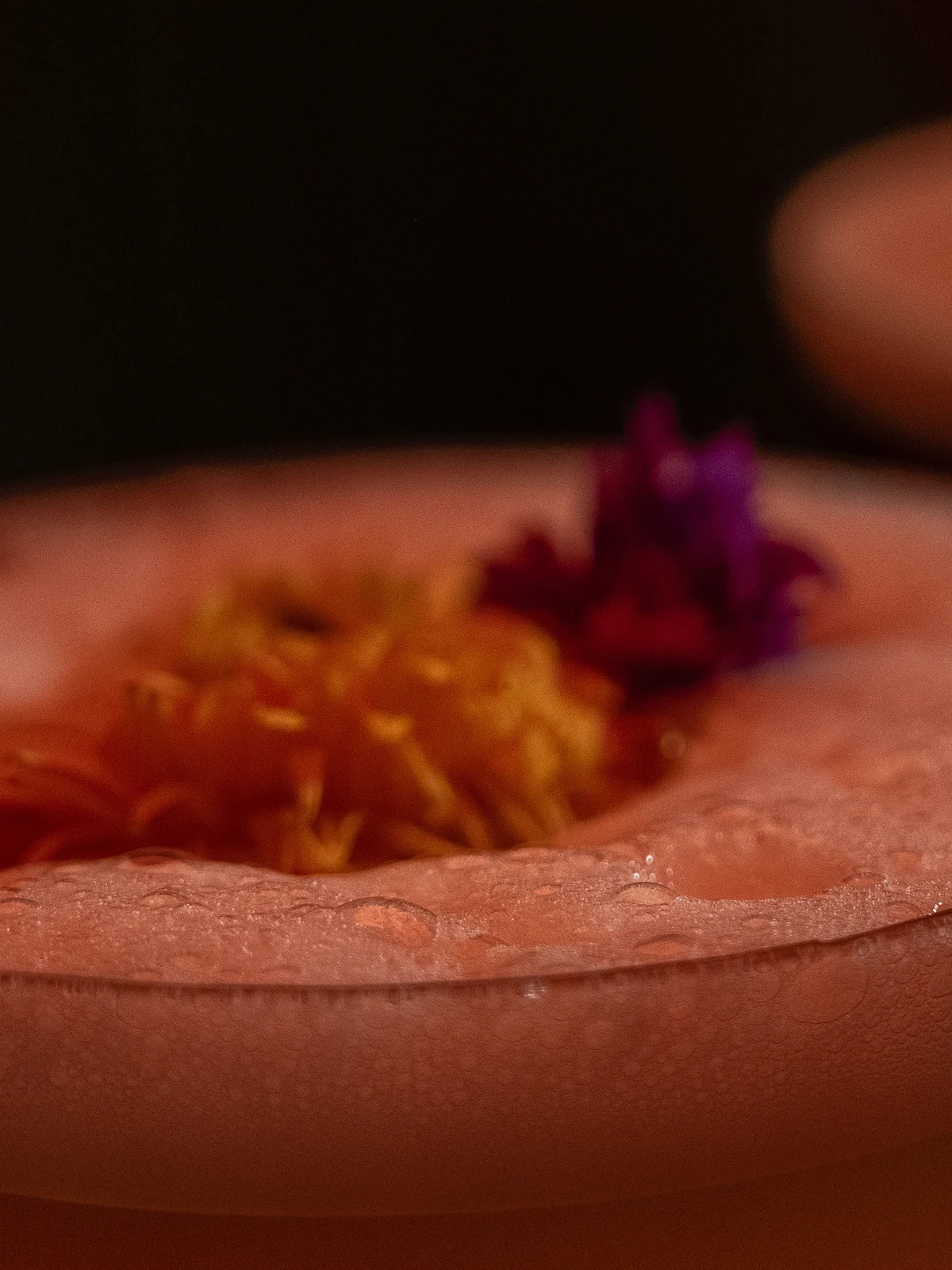 A sour with dried flowers on the foam, at the bar of Mayfair